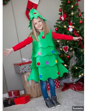 Encantadora Niña En Un Disfraz De árbol De Navidad Foto Premium