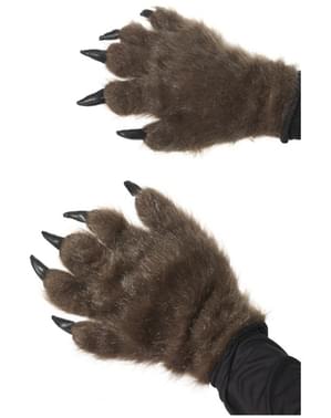 Mãos de monstro peludo castanho