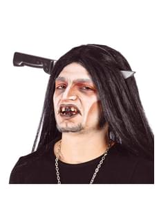 Faca atravessada na cabeça