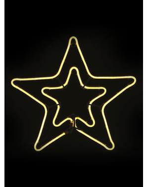 光るクリスマスの星の輪郭