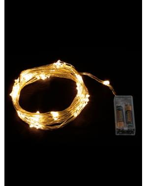 Rama natalícia de luzes brancas quente