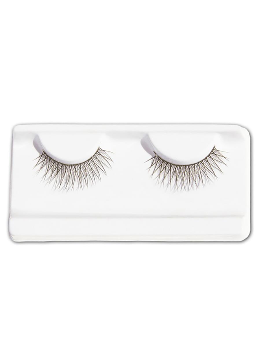 Faux-cils noirs croisés avec colle