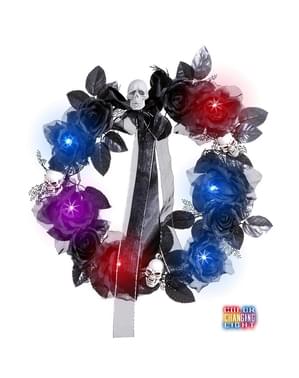 Couronne de morts et roses noires à lumière changeante