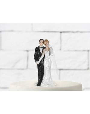 Figur kue pengantin dengan pengantin brunette