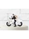 Wedding cake figure with bride and groom on a motorbike