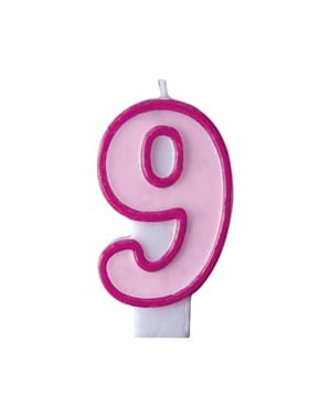 Number 9 birthday candle in pink