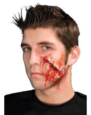 Prótese em látex ferida aberta com alfinetes