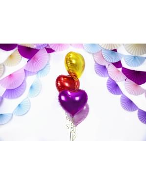 Foil balloon in the shape of a heart in dark pink