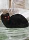 Figurine décorative chat noir aux yeux rouges