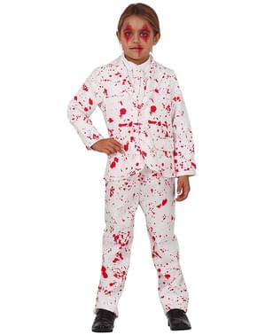 Krvavo belo otroško obleko