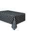Mantel negro con topos blancos