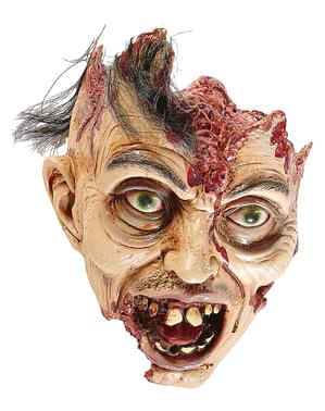 Koristeellinen zombipää hiuksilla