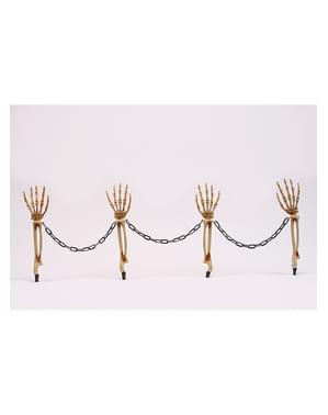 Figuri decorative de brațe scheletice cu cătușe