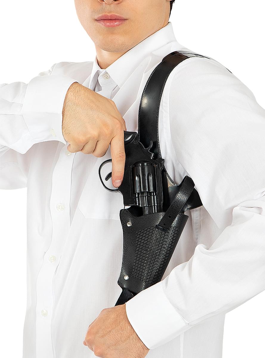 Pistola com coldre de ombro para armas
