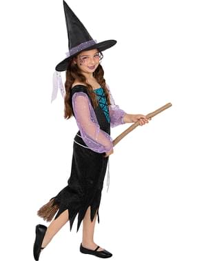 Fille Dans Un Costume De Sorcière Avec Une Baguette Magique Pour Halloween  à L'automne Parc