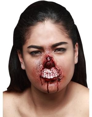 Prótese em látex dentes expostos