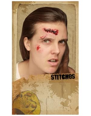 Prótese em látex ferida suturada