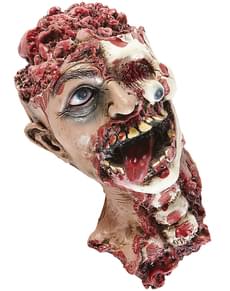 Figura decorativa de cabeça desgarrada