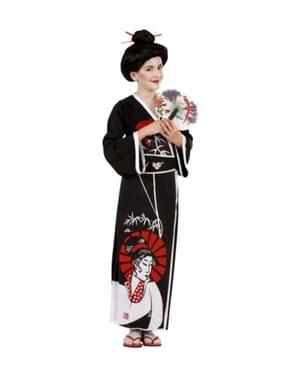 Tüdruk on võluv Geisha kostüüm