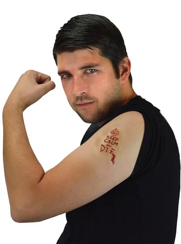 Keep Calm and die engraved in skin prothesis